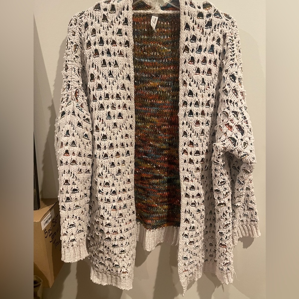 Cardigan. Size large. Never worn.